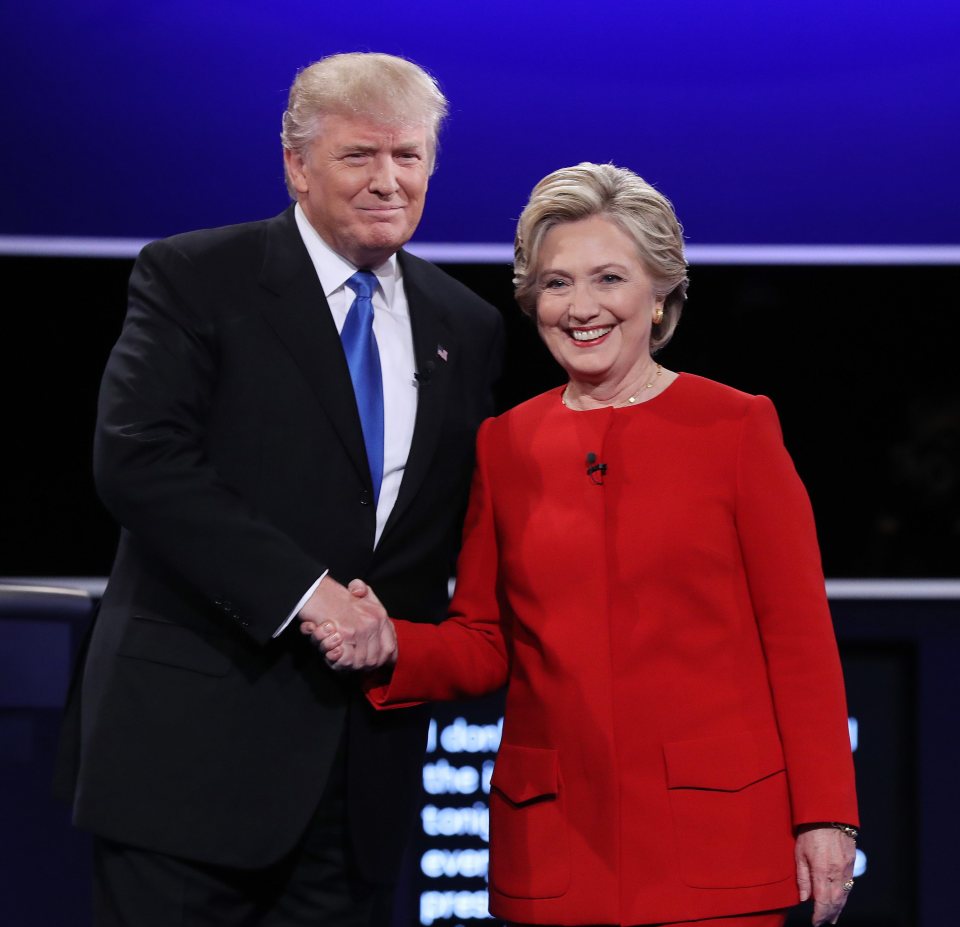 Democrat Hillary Clinton and Republican Donald Trump arrive on stage for the debate