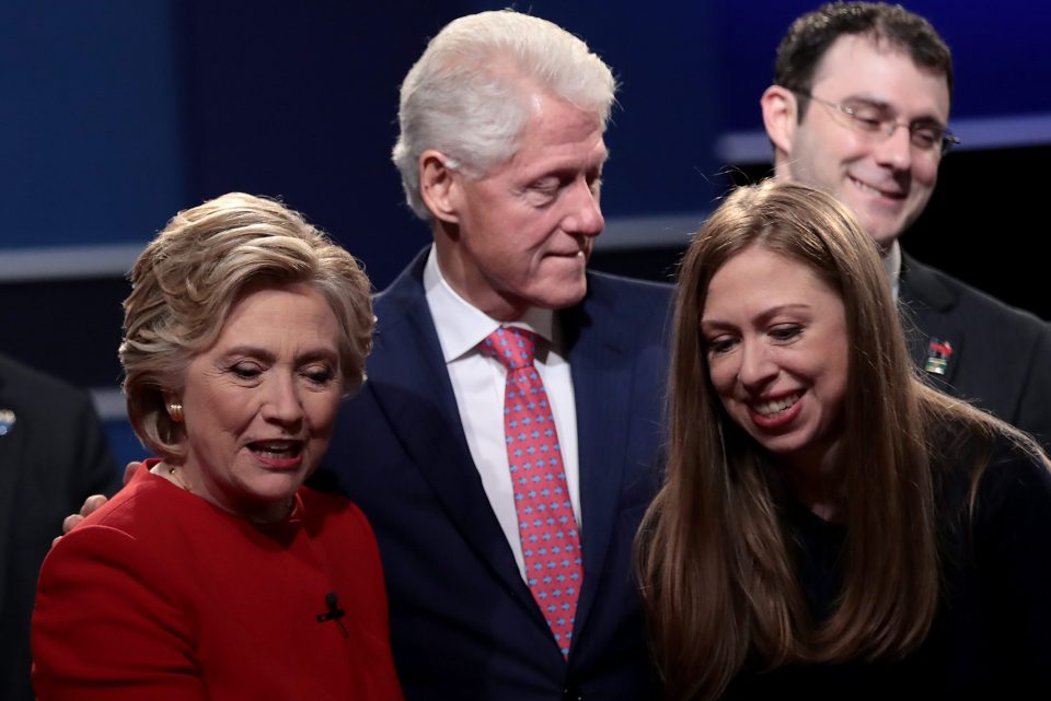 Democratic presidential nominee Hillary Clinton is supported by husband and former U.S. President Bill Clinton and daughter, Chelsea Clinton