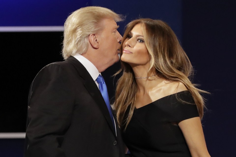 Donald Trump kisses his wife Melania Trump