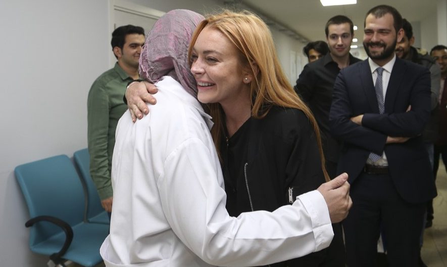 Lindsay Lohan visits Syrians