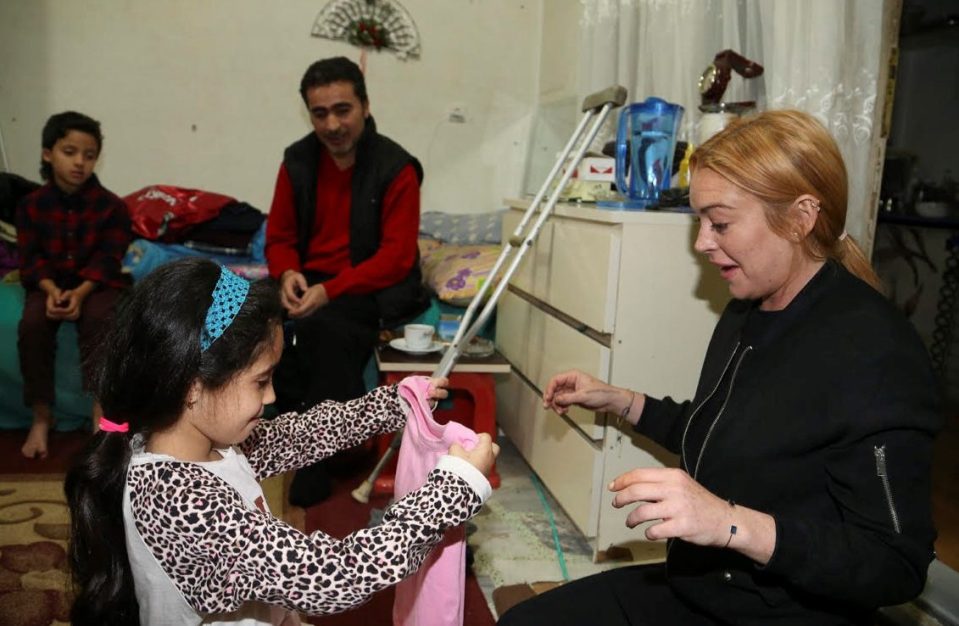 Lindsay Lohan visits Syrians