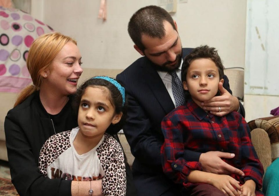 Lindsay Lohan visits Syrians