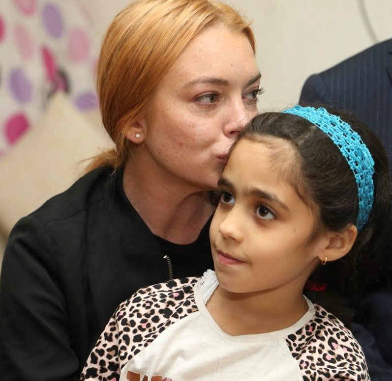 Lindsay Lohan visits Syrians