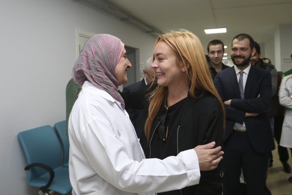 Lindsay Lohan visits Syrians
