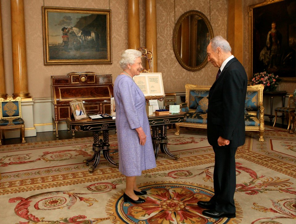 Honoured . . . Peres at Buckingham Palace