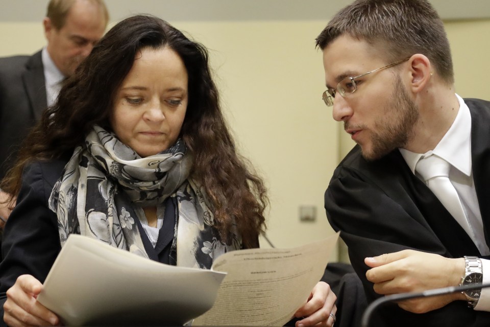 Terror suspect Beate Zschaepe (L) talks