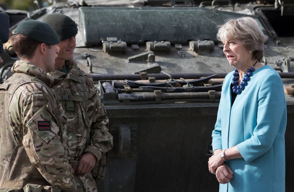 PM to halt war claims . . . Theresa May meets troops at Bulford camp 