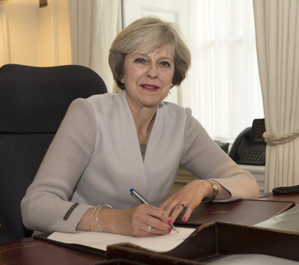 Carry on . . . Theresa May