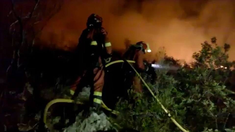 Firefighters tackle the blaze which has rocked the community of Javea
