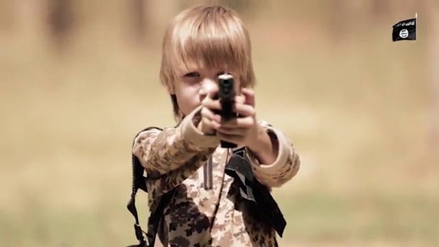 Shocking ISIS video shows lad forced to shoot prisoner