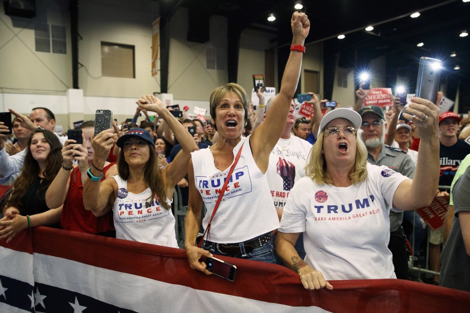 Supporters of Republican presidential candidate Donald Trump cheer during a campaign rally at the South Florida Fairgrounds and Convention Center, Thursday, Oct. 13, 2016, in West Palm Beach, Fla. (AP Photo/ Evan Vucci)