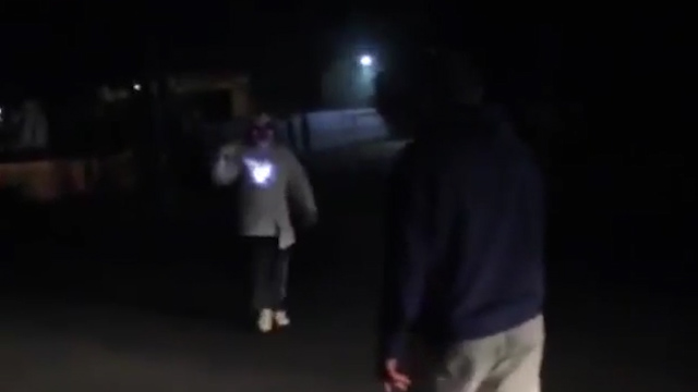 The clown can be seen approaching the men, with one heard to say 'what's he going to do'