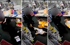 Shocking moment hammer-wielding thugs kick brave worker in the head during violent post office raid