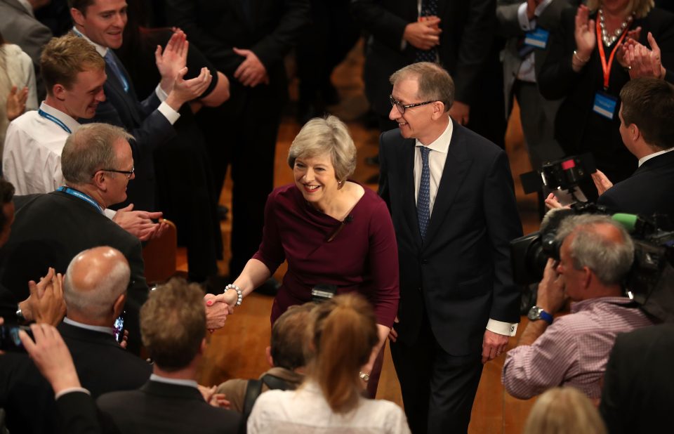 She shook hands with delegates as she brought the four-day conference to a close
