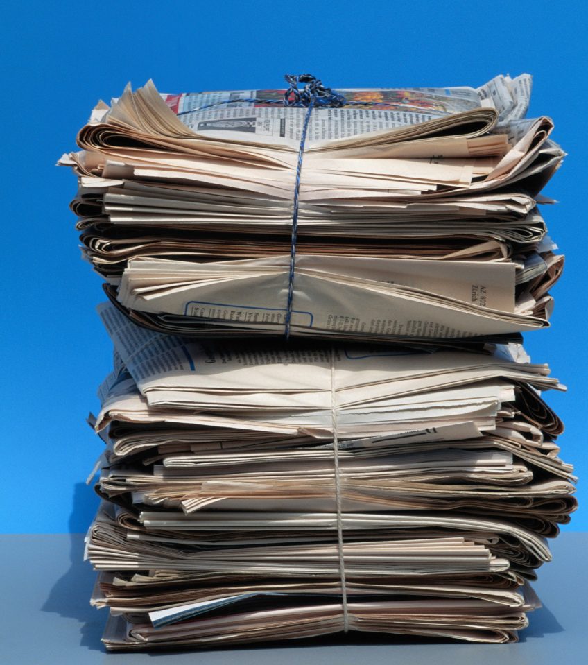 PAPER RECYCLING WITH STACK OF NEWSPAPERS