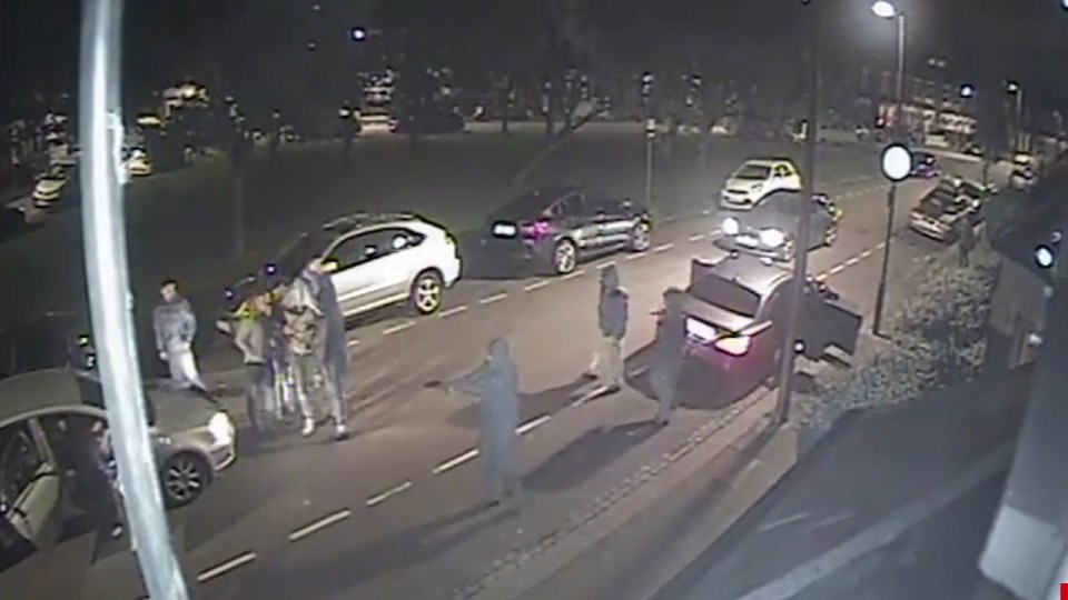 hooded-gunman-brandishes-weapon-in-violent-clash-near-turnpike-lane-00_00_22_10-still004