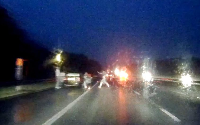 near-miss-of-man-doing-a-karate-kick-on-motorway-00_00_14_15-still007