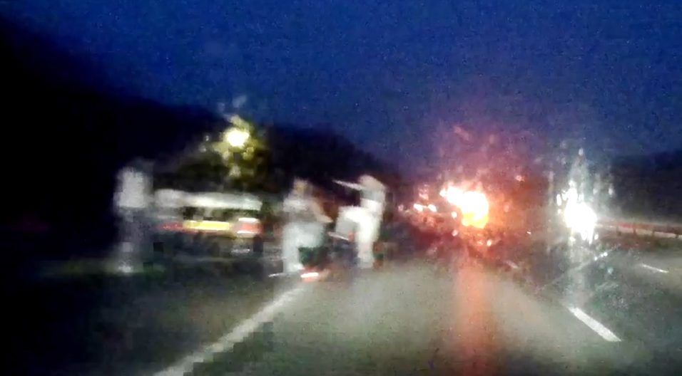 near-miss-of-man-doing-a-karate-kick-on-motorway-00_00_17_12-still008