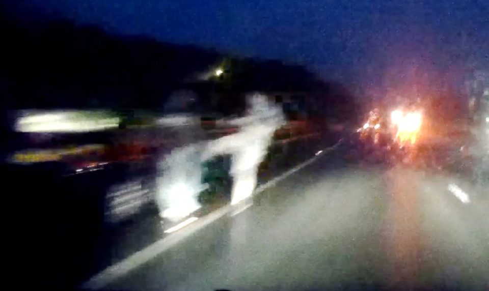near-miss-of-man-doing-a-karate-kick-on-motorway-00_00_19_15-still009