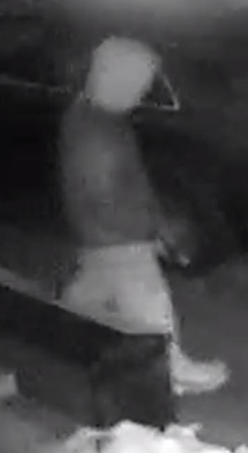 The suspect pictured slashed the victim with a knife before fleeing the scene in Tooting, south London