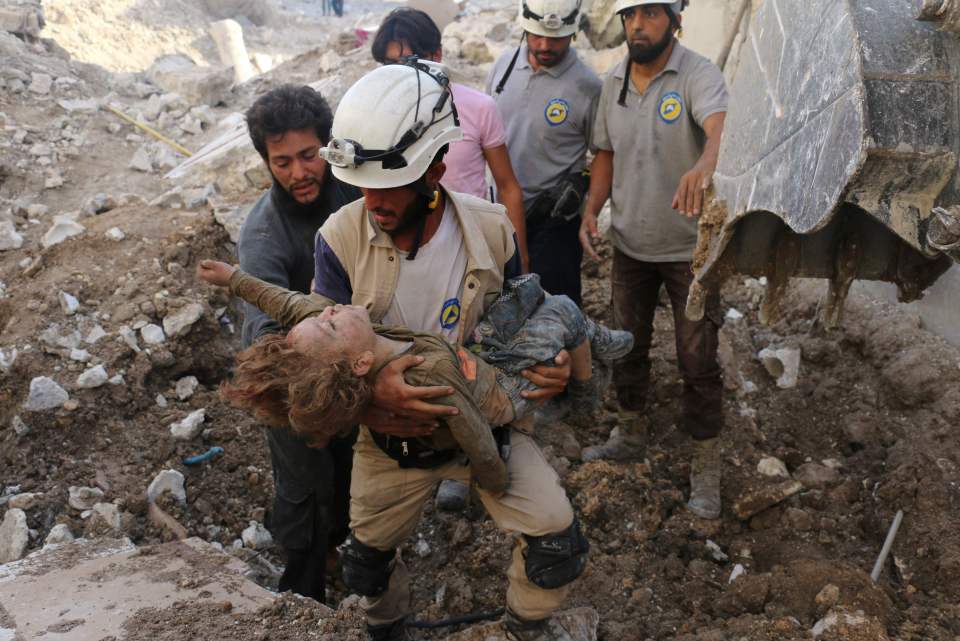 A Syrian civil defence volunteer, known