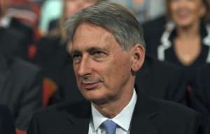 Philip Hammond flies to US to promise big banks he'll get a Brexit deal that's good for their bottom line