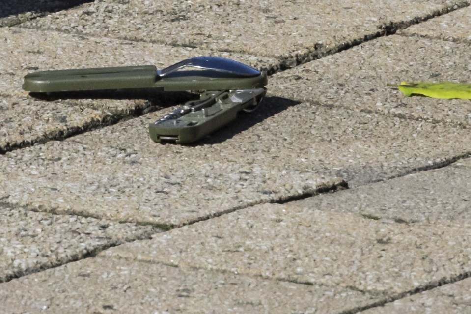 A knife is pictured on the scene where two policemen were stabbed