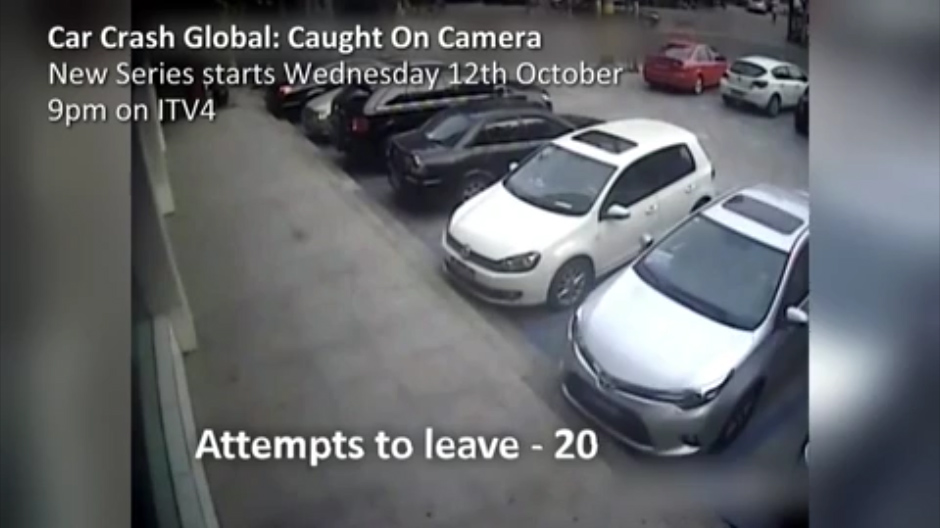 The car manages to hit the one next to it on the way out