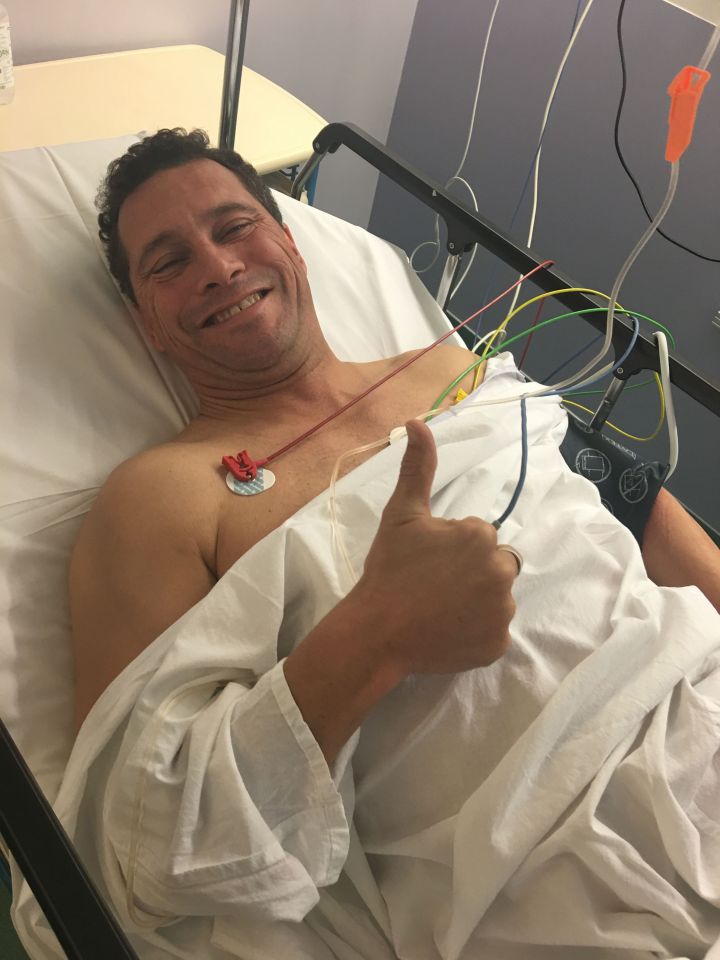 Mr Woolfe was later pictured smiling from his hospital bed