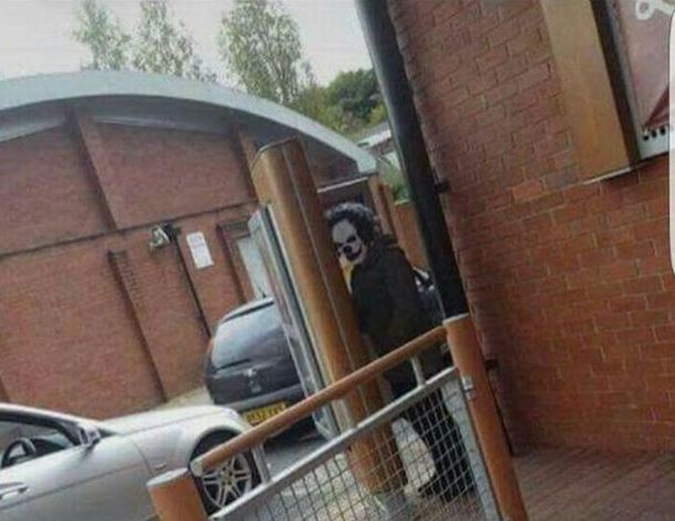 Hidden in plain sight . . . a picture taken in Kidderminster shows a man dressed as a clown at the drive-through