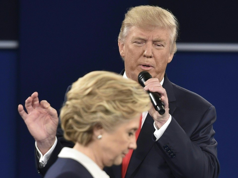 Donald Trump's apparent lead over his rival following the debate (pictured) was swelled by online 'bots', a study has found