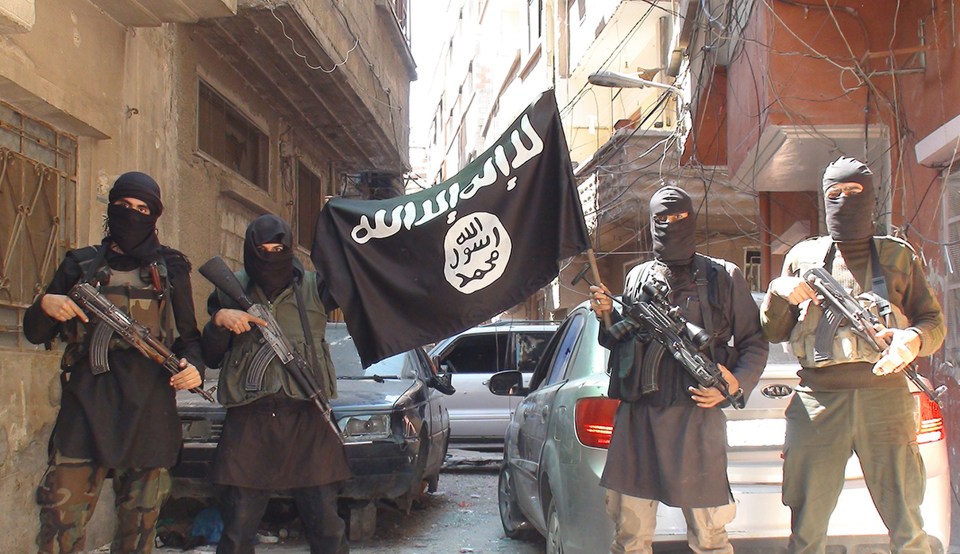 A photo posted on internet on April 7, 2015 shows ISIS or Daesh (Daech) or 'Islamic State' group militants posing in Yarmouk