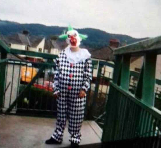 Connor Jones, 18, terrified children at a school by dressing as a clown in a black and white jumpsuit with snarling scary mask