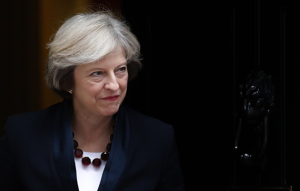 British Prime Minister Theresa May exits