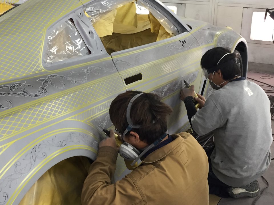 The vehicle was intricately carved by hand by master engraver Takahiko Izawa 