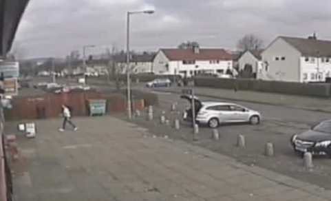 The CCVT image shows John Leathem walking away from his car after dumping Paige's body inside. Her foot, wearing a white sock, is clearly visible