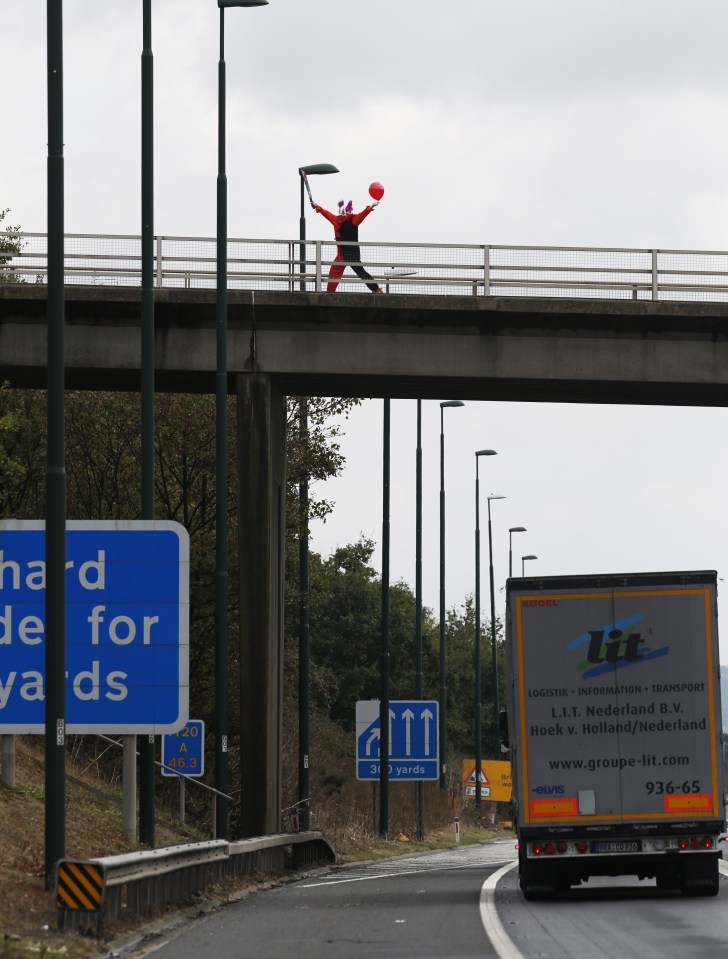 Prankster waves his arms, waving a sword and balloon