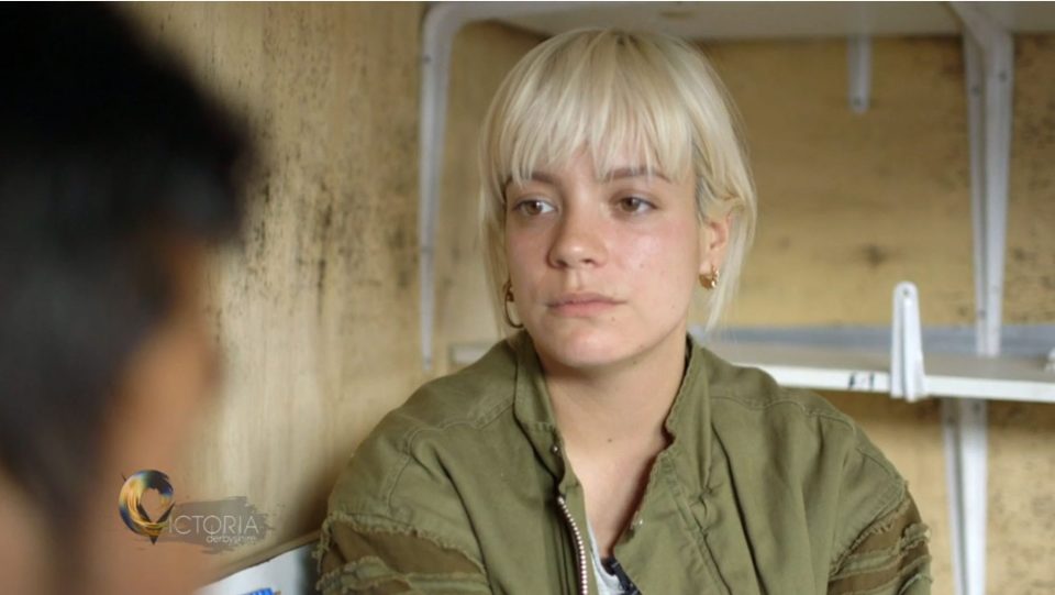 Lily Allen at migrant camp crying 