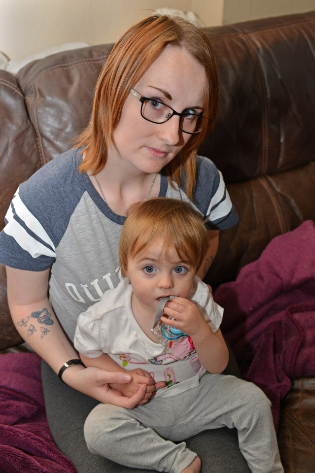 Worry . . . Charlotte with tot, who were both unscathed after vile yob's attack