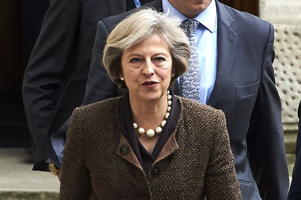On the march . . . PM outside Foreign Office after briefing diplomats