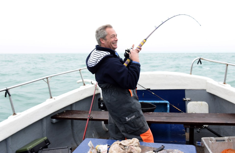 Ukip leader Nigel Farage catches a cod while fishing in the channel