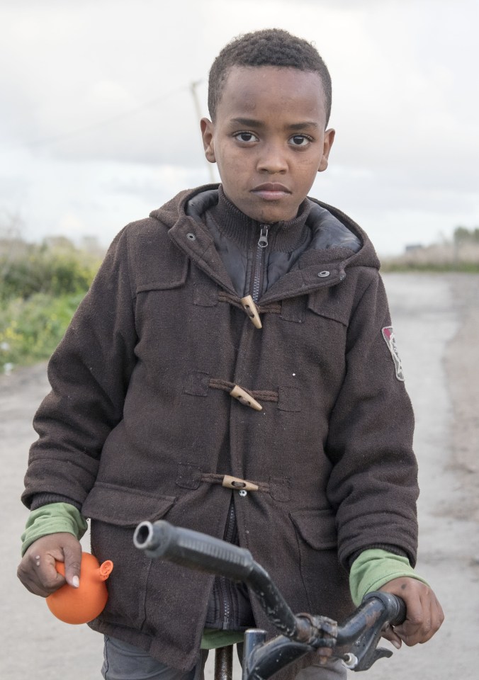 This is a REAL child . . . Daniel, 9, is still stuck in Calais Jungle