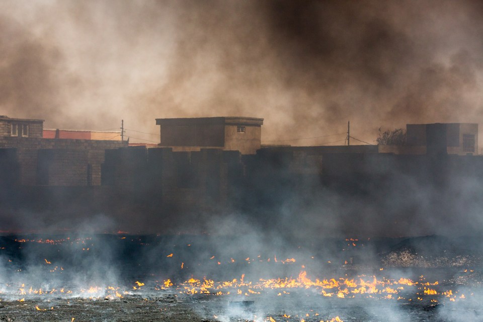 The terror group employed a similar tactic as they fled Qayarrah in northern Iraq earlier this month