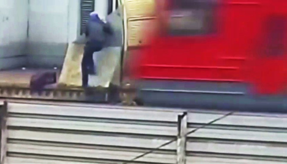 According to reports, the man gets hit by the force of the wind from the passing train