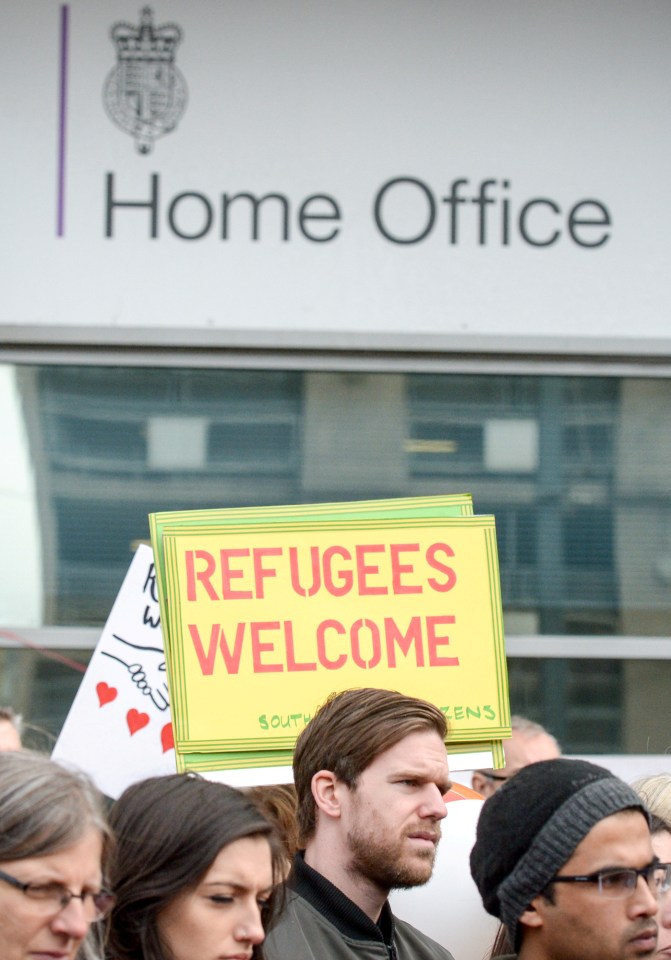 Group of supporters for the migrant children outside of Lunar House home office building, Croydon