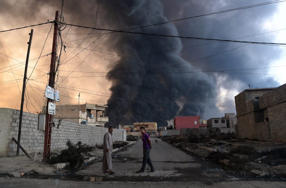 Retreating ISIS fighters have laid waste to towns they once held, setting fire to oil fields