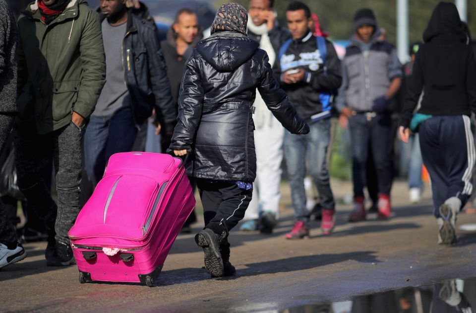 Migrants have been spotted packing up their bags as the jungle is closed