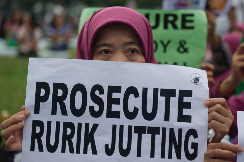 The demonstrators, from Indonesian migrant worker organisations, called for compensation for the victims' families