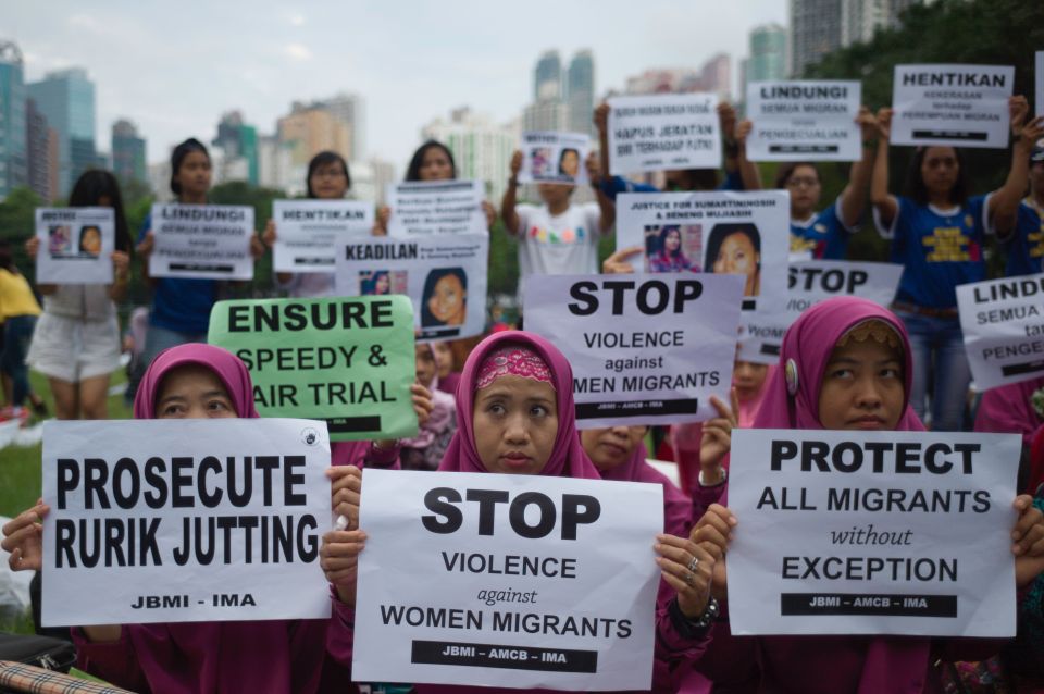 A group of protesters gathered outside the court demanding justice for the victims
