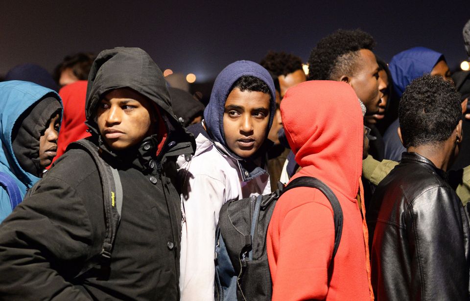 Thousands of migrants today began to leave the infamous Jungle camp in Calais